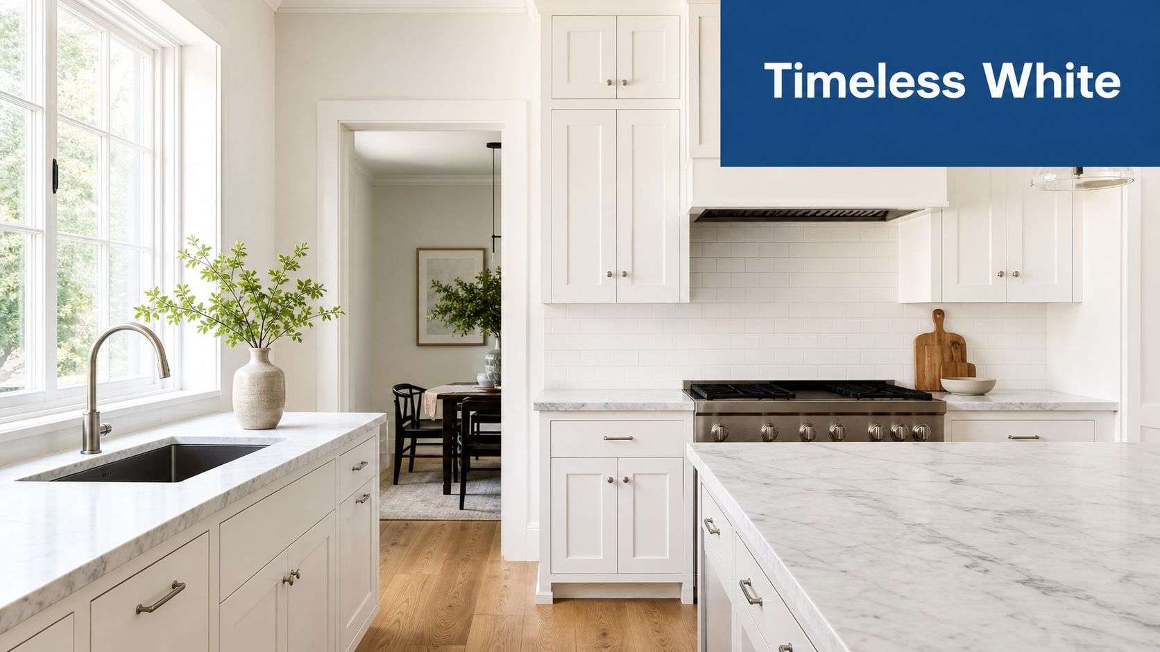 A bright modern white kitchen featuring marble countertops, elegant cabinetry, and a clean minimalist aesthetic design style.